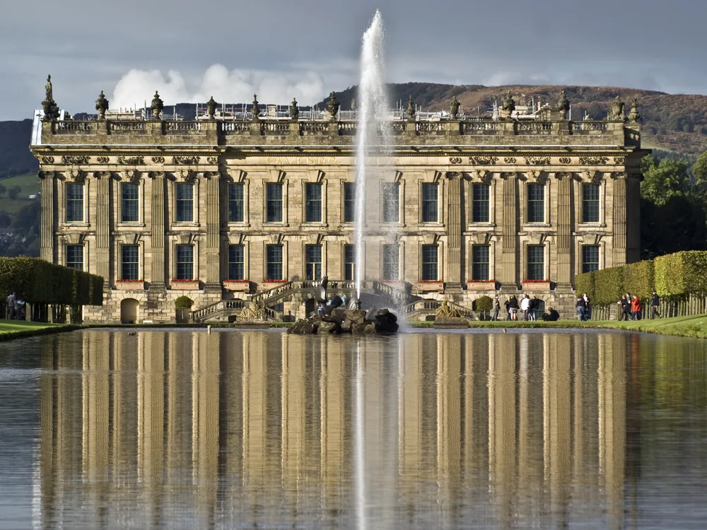 Chatsworth House in the Peak District — the ancestral home of the Dukes of Devonshire, rebuilt in Baroque style 1686–1707, with Capability Brown's landscape and the Emperor Fountain in the foreground