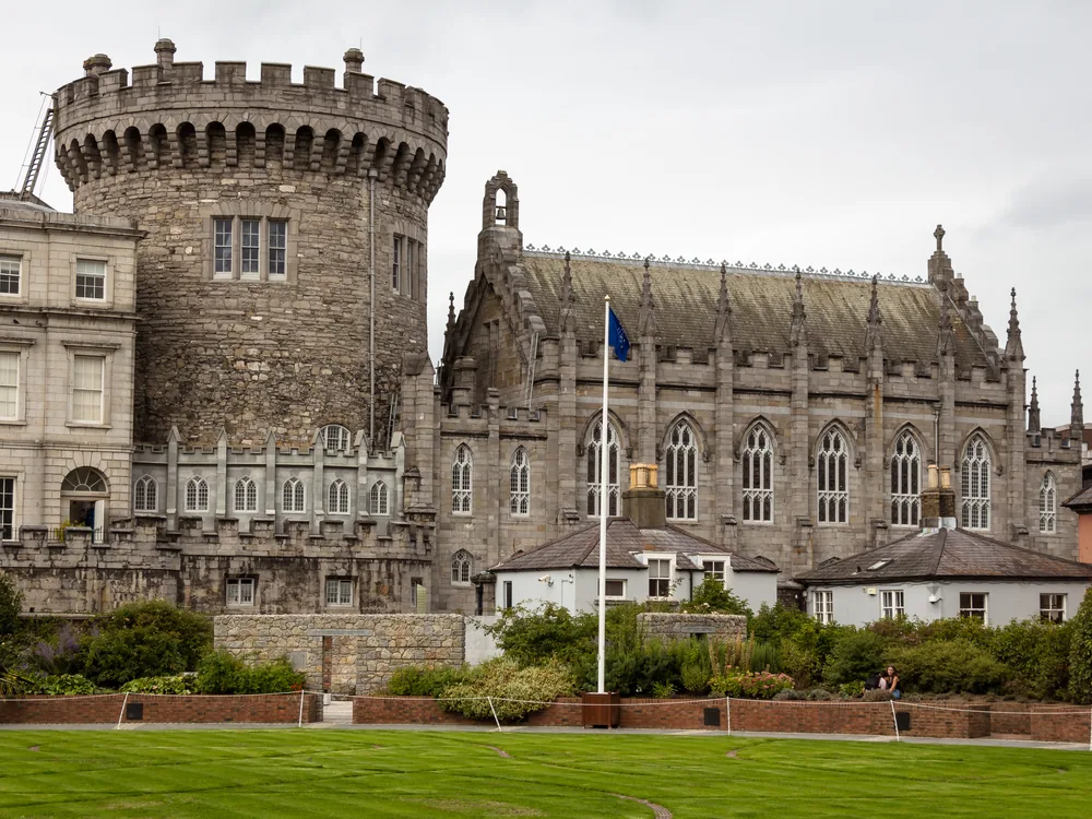 Dublin Castle's Upper Yard courtyard with the Chapel Royal and the Figure of Justice above the main gate — the seat of British rule in Ireland for 700 years, handed over to the Irish Provisional Government in January 1922