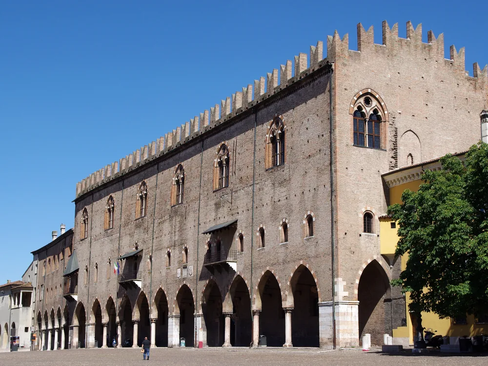 Palazzo Ducale di Mantova — the Gonzaga dynasty's city-palace overlooking Piazza Sordello in Mantua, with the Castello di San Giorgio tower housing Mantegna's Camera degli Sposi