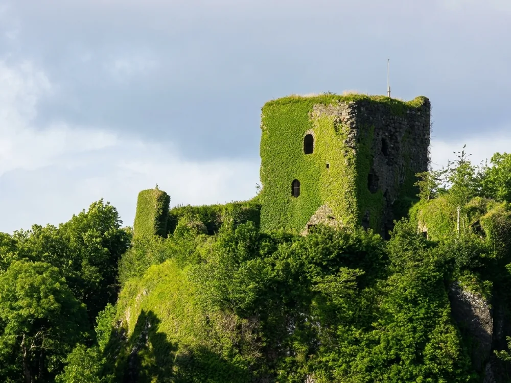 Dunollie Castle near Oban, Scotland — the ruined seat of the Clan MacDougall chiefs beside the 18th-century 1745 House