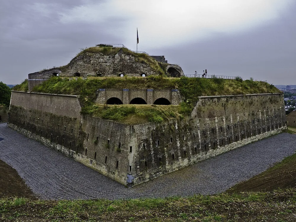 Fort Sint Pieter on the St Pietersberg hill above Maastricht, Netherlands — the 1701–1702 Dutch Baroque hornwork fortress designed by Isaac van Couhorn, with its network of limestone underground passages carved with three centuries of military inscriptions