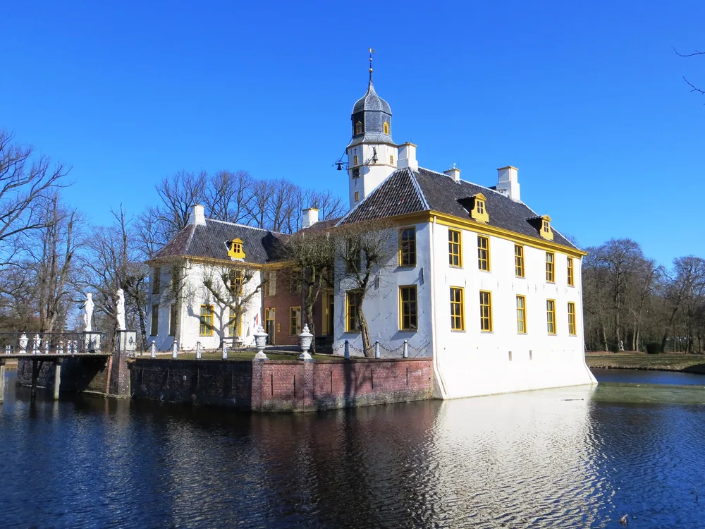Fraeylemaborg in Slochteren, Groningen — the largest surviving borg in Groningen province, a 1770-remodelled manor house on its medieval moated site, surrounded by formal gardens and a landscape park
