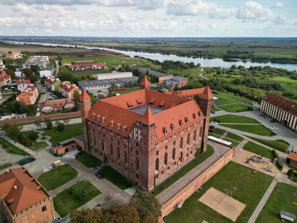 Gniew Castle above the Vistula in Pomerania, Poland — a late-13th-century Teutonic Order fortress, now a history park with castle, Hotel Rycerski and Marysieńka Palace accommodation