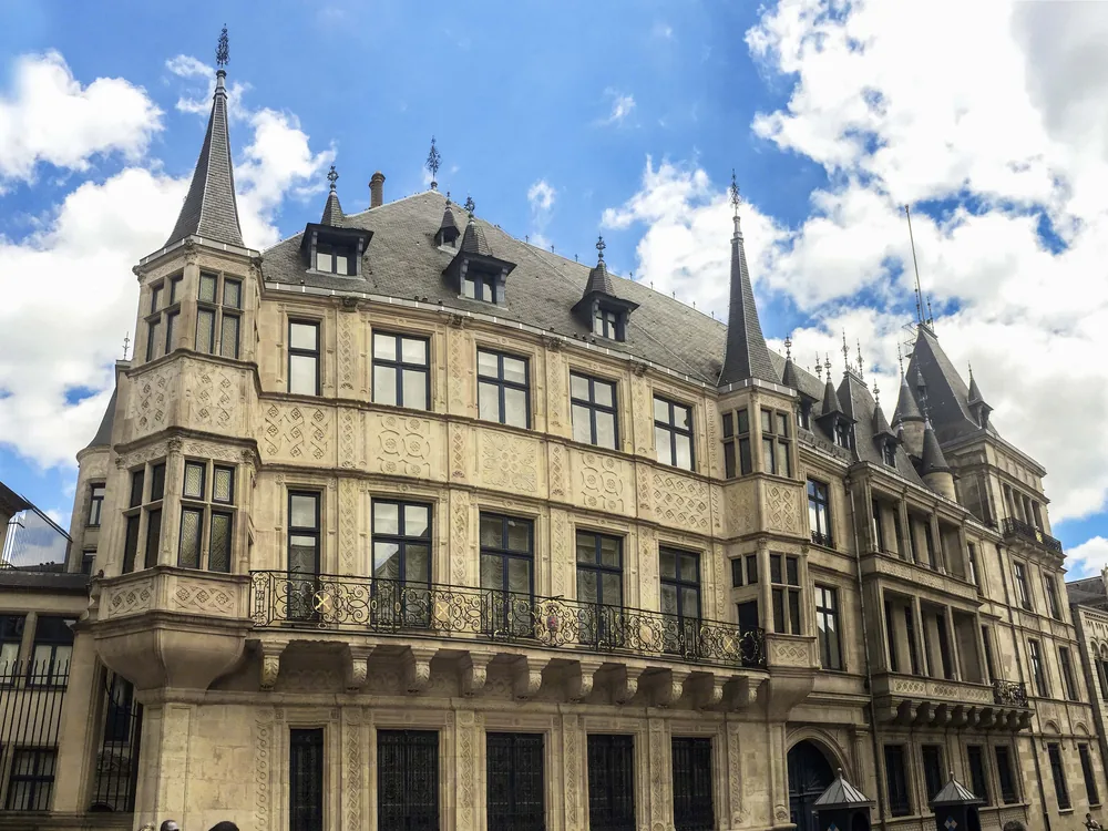 The Grand Ducal Palace in Luxembourg City — the official residence of the Grand Duke of Luxembourg, its Renaissance facade with Nassau-Weilburg coats of arms on the Rue du Marché-aux-Herbes in the historic old town