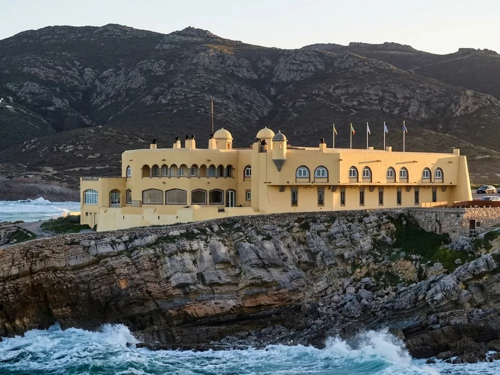 Guincho Fortress on the Atlantic coast near Cascais, Portugal — a 17th-century coastal fortification now a Relais & Châteaux hotel with a Michelin-starred restaurant