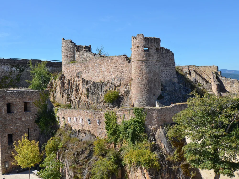 Hohlandsbourg Castle above the Munster Valley near Colmar, Alsace — the 1279 Habsburg castle with its surviving round towers and panoramic terrace overlooking the Alsatian plain