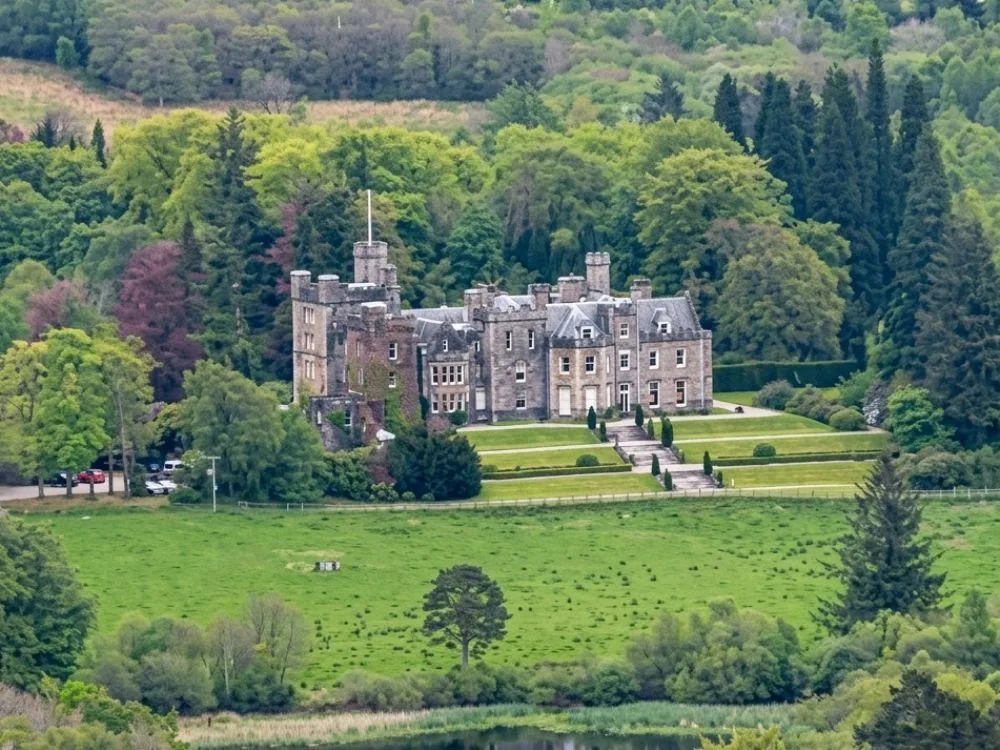 Inverlochy Castle Hotel, a Victorian Scots Baronial mansion near Fort William, Scotland, with Ben Nevis in the background
