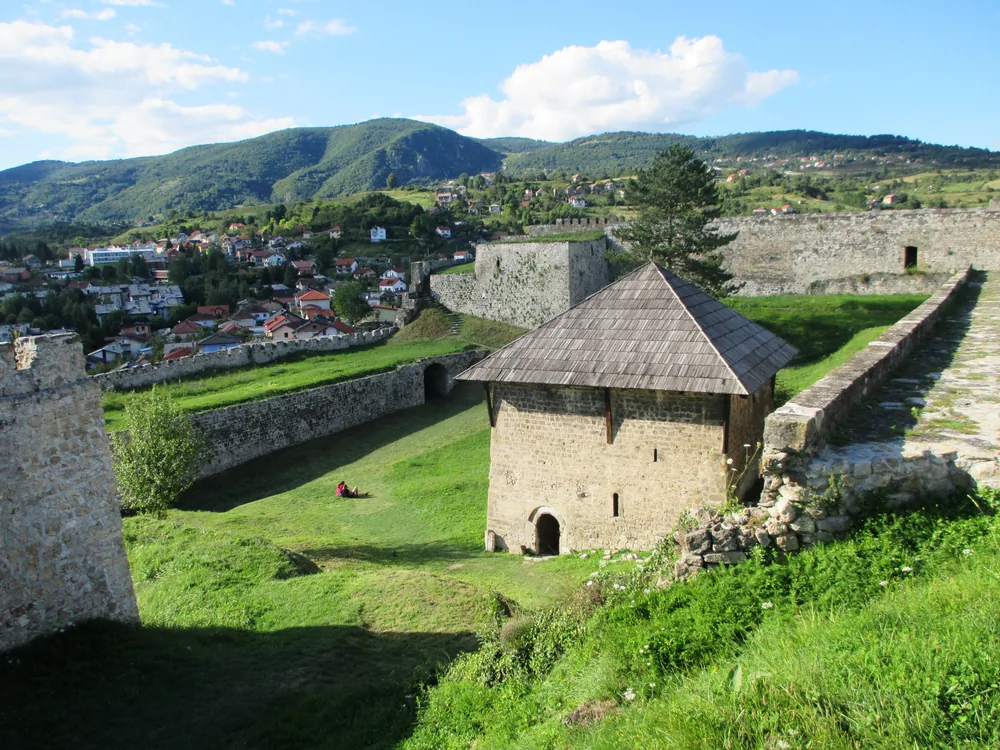 Jajce Fortress (Jajačka tvrđava) above the Pliva-Vrbas confluence, Central Bosnia — the medieval capital of the Kingdom of Bosnia with the Medvjed Tower and the Pliva Waterfall at its foot