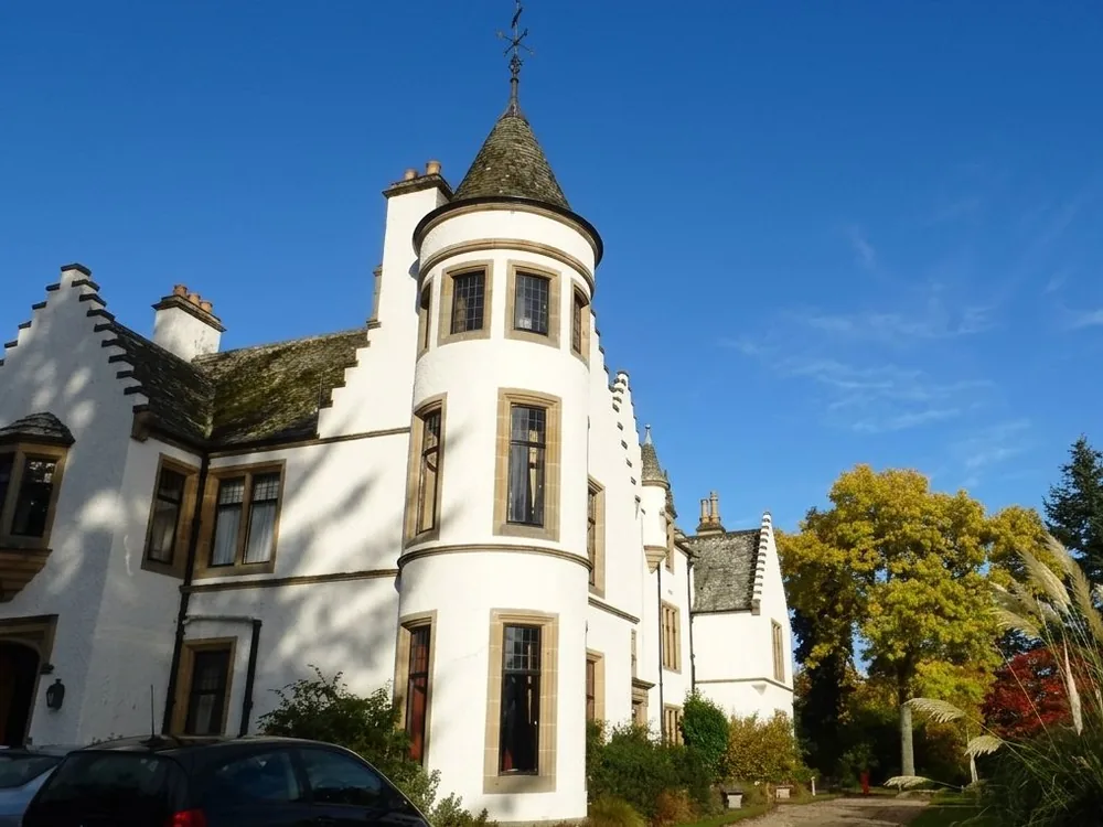 Kincraig Castle above the Cromarty Firth near Invergordon, Scotland, a Georgian house remodelled in Baronial style in 1872