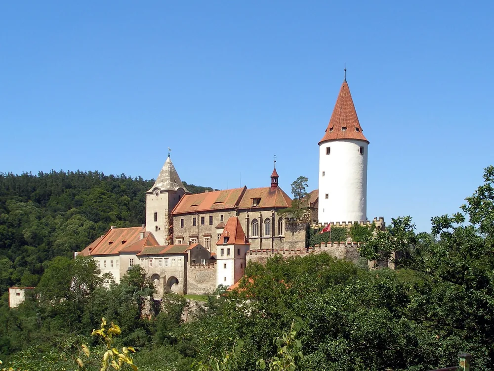 Křivoklát Castle — the Gothic royal hunting castle on its wooded spur above the Berounka River in the Křivoklátsko forest reserve, Central Bohemia, Czech Republic