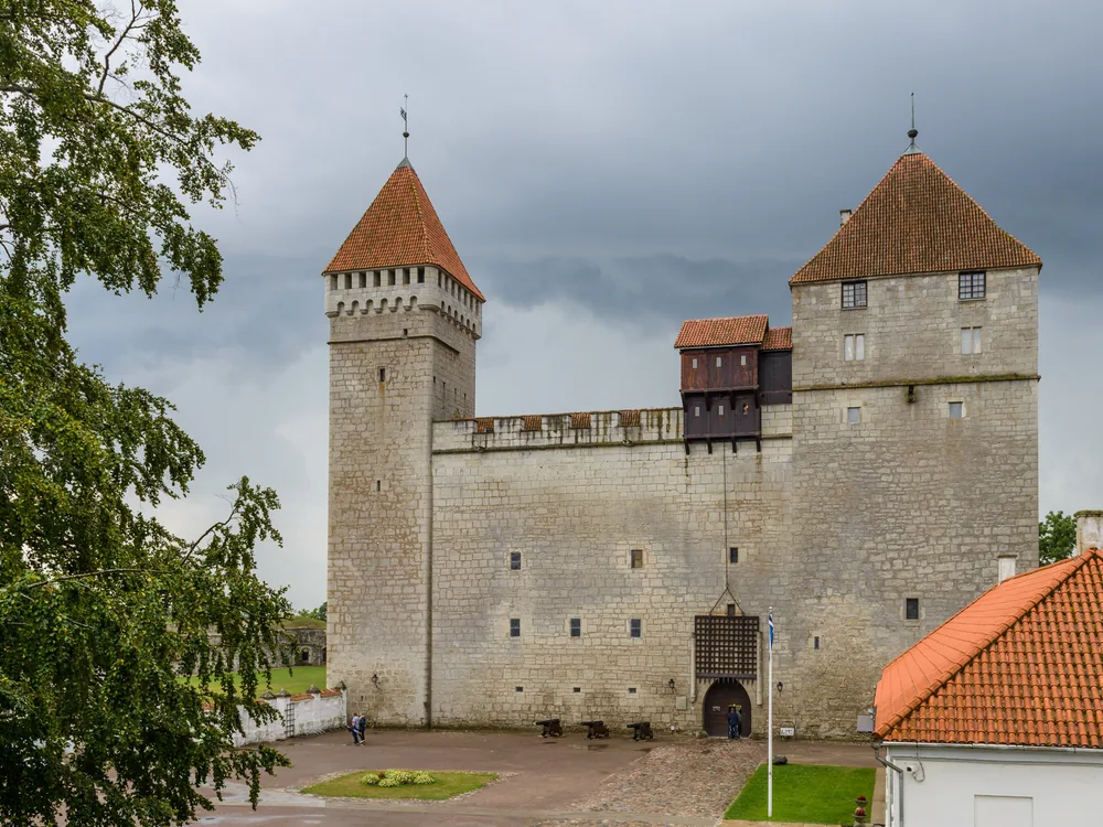Kuressaare Castle 14th-century bishop's fortress reflected in the moat on Saaremaa Island, Estonia