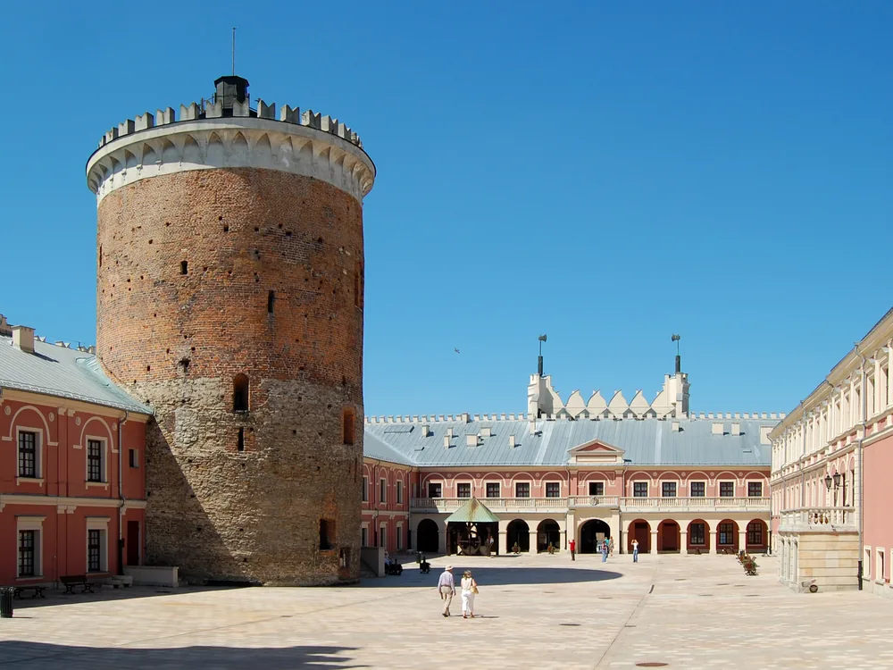 Lublin Castle on its limestone hill above the Old Town — where the Union of Lublin was signed in 1569 and where Byzantine frescoes survive in the Holy Trinity Chapel