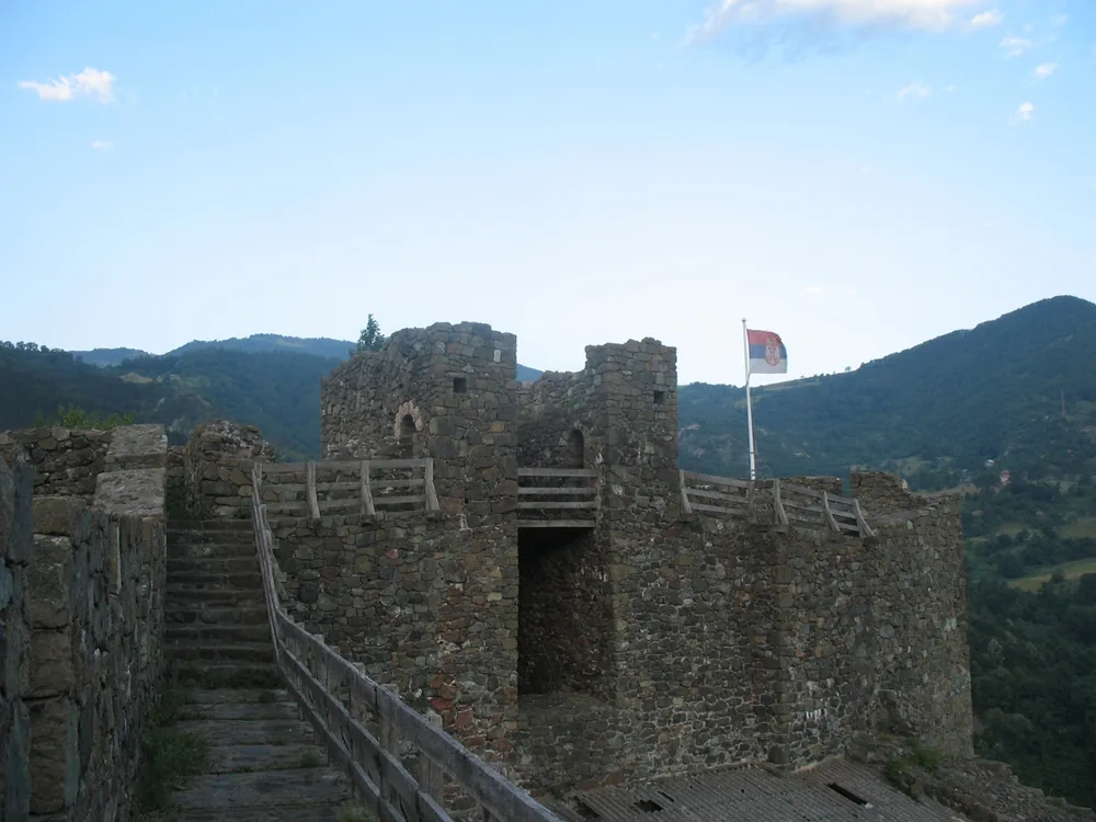 Maglič Fortress above the Ibar River gorge in Serbia — the 13th-century Nemanjić dynasty fortress perched on a rocky outcrop above the mist-filled canyon in the Valley of the Kings region