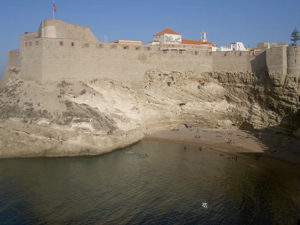 Melilla Fortress on its rocky promontory above the Mediterranean, with the Renaissance walls and towers of the Medina Sidonia overlooking the sea