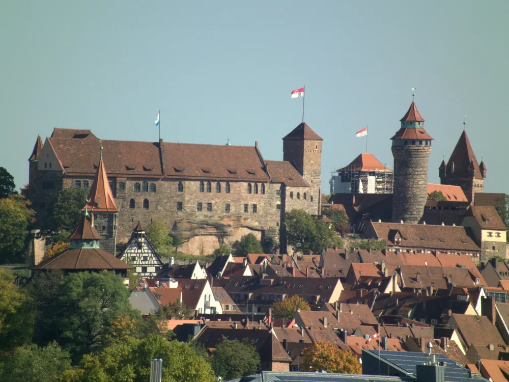 Kaiserburg Nürnberg — the Holy Roman imperial castle above the medieval old town of Nuremberg, with the Sinwell Tower and the Palas on the sandstone ridge