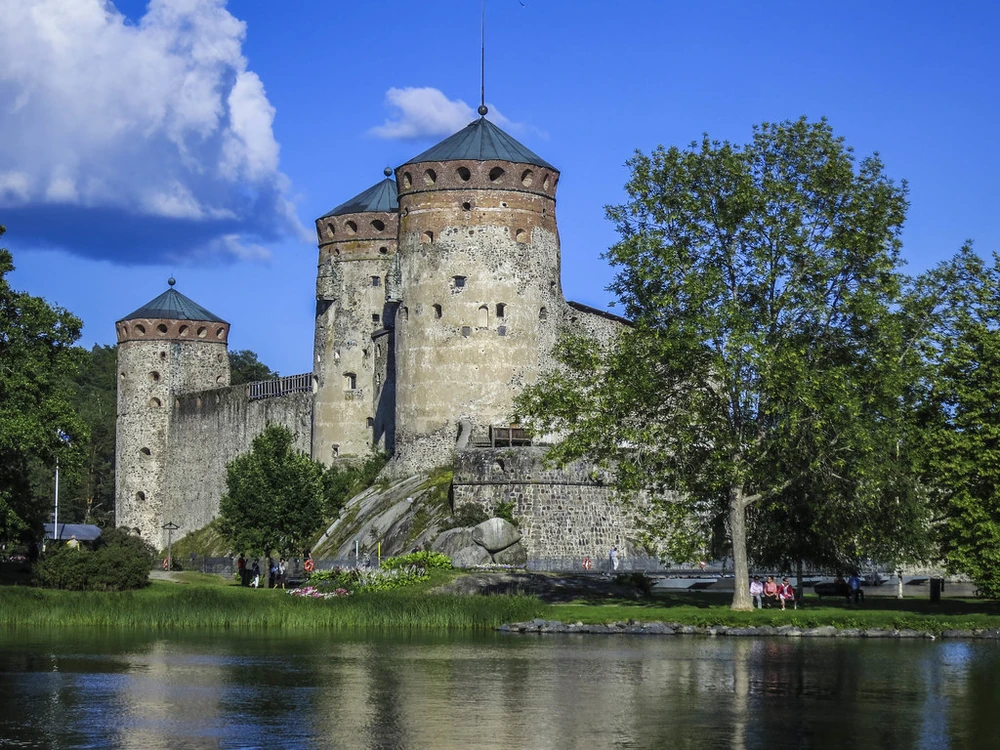 Olavinlinna Castle rising from its island in the Finnish lake system at Savonlinna, Finland