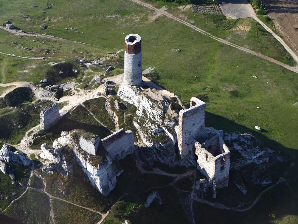 Olsztyn Castle ruins near Częstochowa — the Eagles' Nests chain karst cave castle with its round main tower on the limestone outcrop, ruined since the Swedish Deluge of 1655