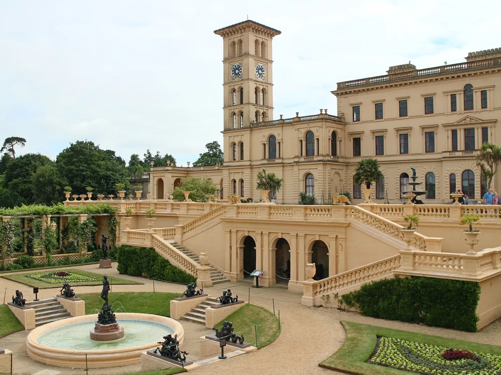 Osborne House on the Isle of Wight — Queen Victoria and Prince Albert's Italianate seaside retreat, where Victoria died in 1901, with campanile towers and terraced gardens facing the Solent