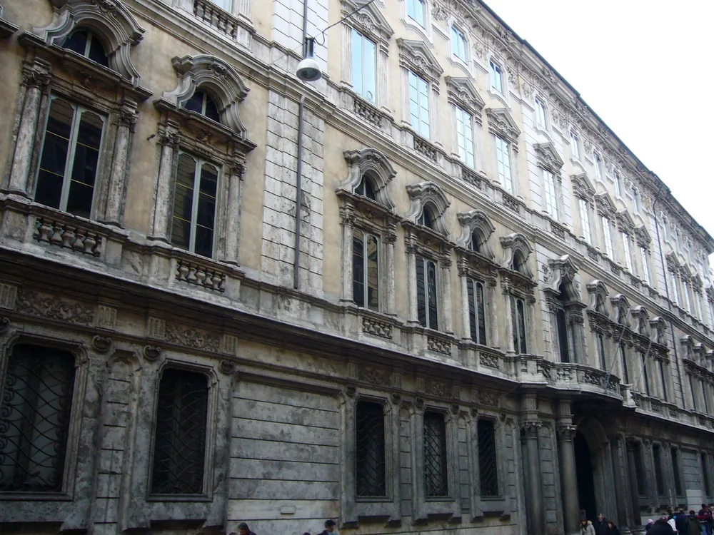 Palazzo Doria Pamphilj on Via del Corso, Rome — the private palace and gallery of the Doria Pamphilj family with its Rococo facade, housing the Velázquez portrait of Innocent X and works by Caravaggio, Raphael, and Titian