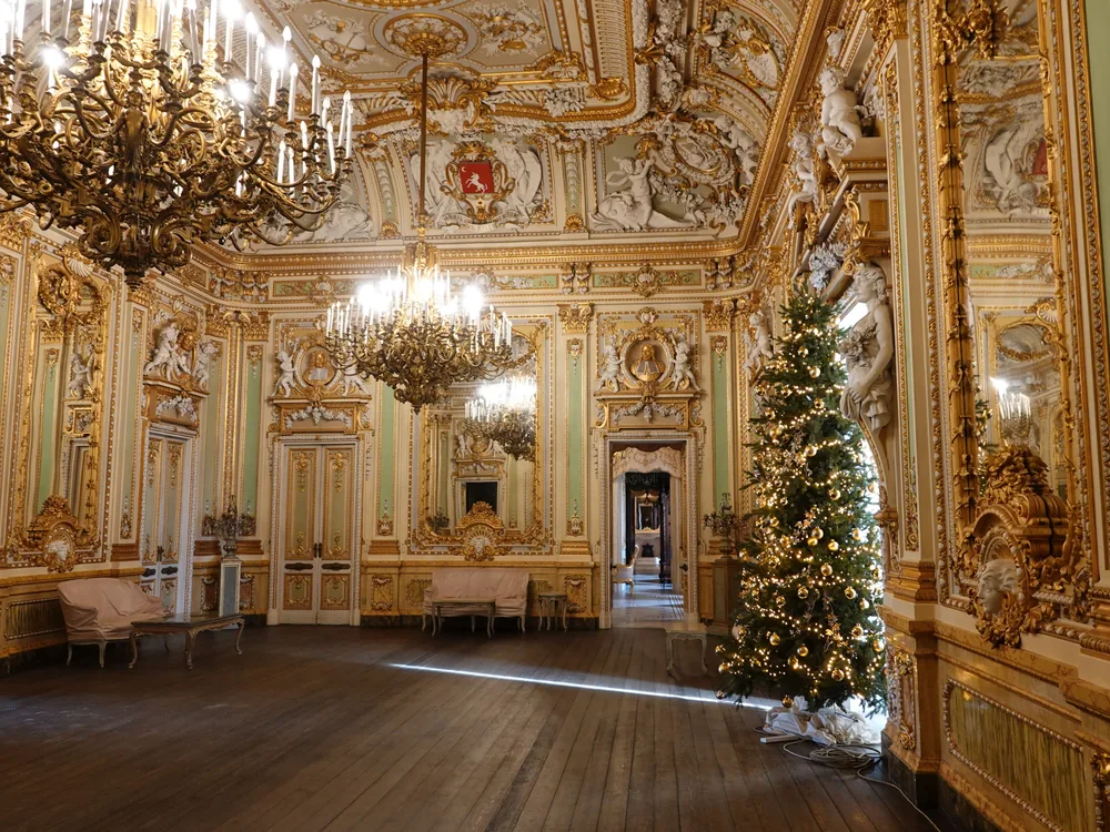 Palazzo Parisio in Naxxar, Malta — the Belle Époque palace façade and formal baroque garden with box hedges and classical fountains