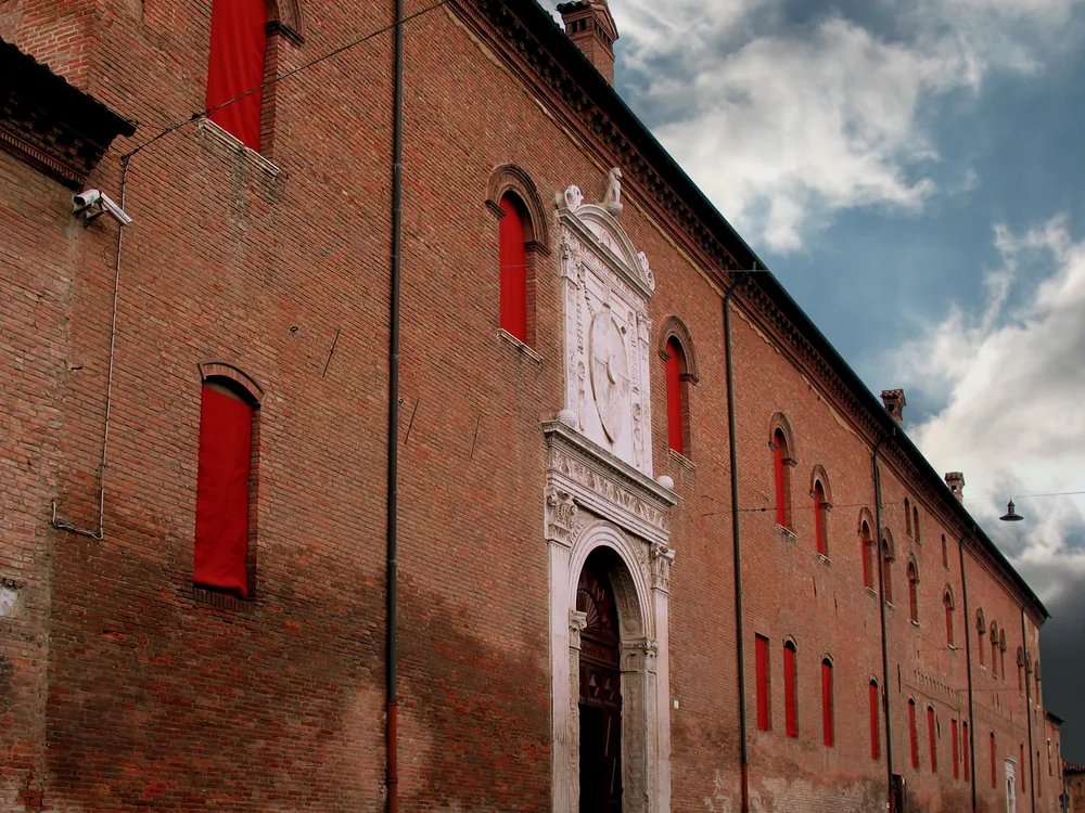 Palazzo Schifanoia in Ferrara — the Este pleasure palace whose Salone dei Mesi holds Italy's greatest secular fresco cycle outside Florence