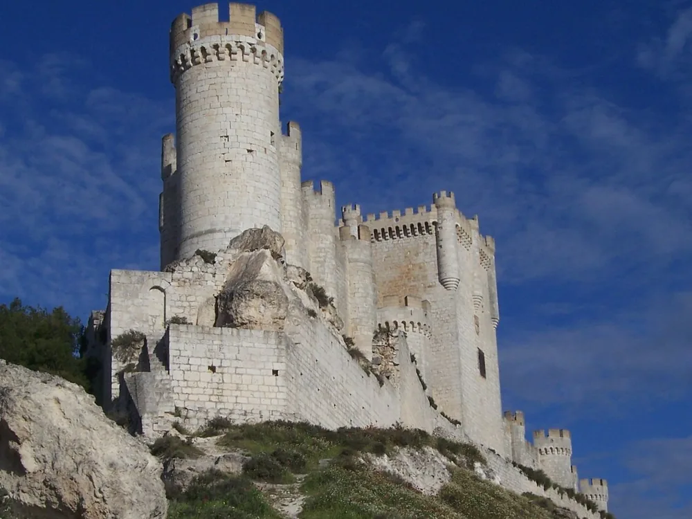 Peñafiel Castle — the elongated ship-shaped medieval fortress above the town of Peñafiel in the Ribera del Duero wine region, Castile and León, Spain