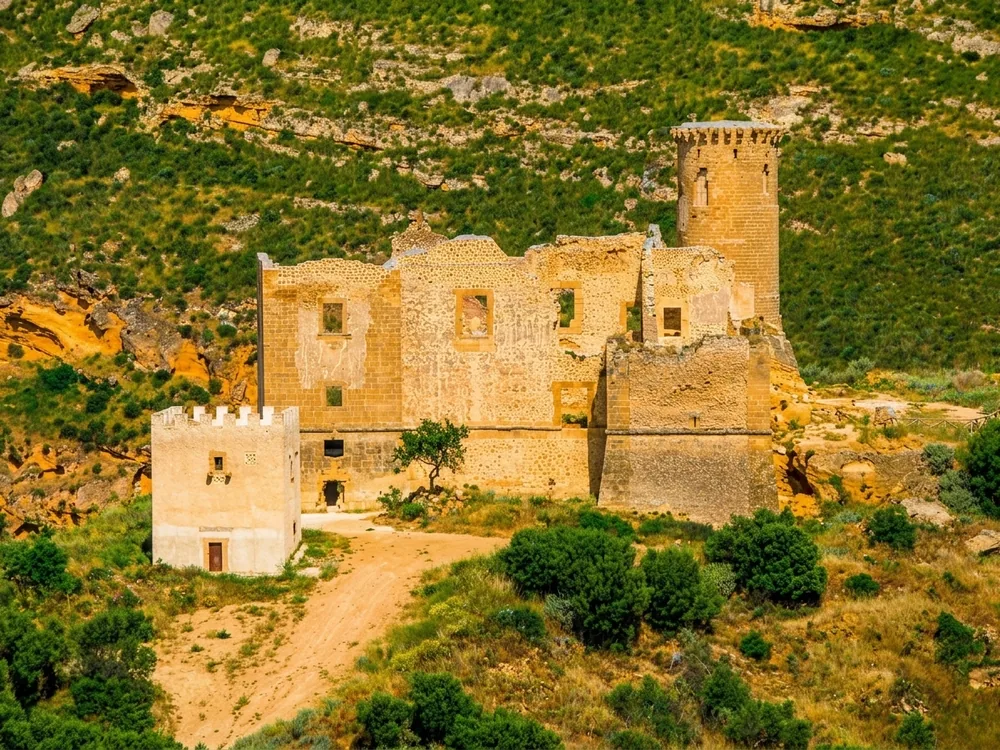 Poggiodiana Castle ruins above Ribera in Agrigento province, Sicily — the Aragonese medieval hilltop fortress overlooking the Verdura river valley in southwestern Sicily