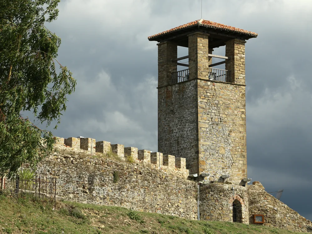 Preze Castle (Kalaja e Prezës) on its ridge north of Tirana, Albania — the 13th-century Thopia clan fortress commanding the corridor between Durrës and the Albanian interior