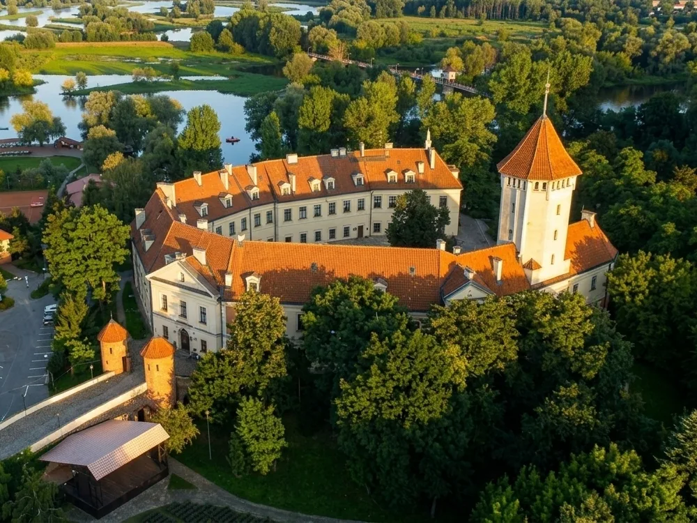 Pułtusk Castle on the Narew river in Masovia, Poland — the former bishops' castle, rebuilt by 1989 as the Dom Polonii hotel