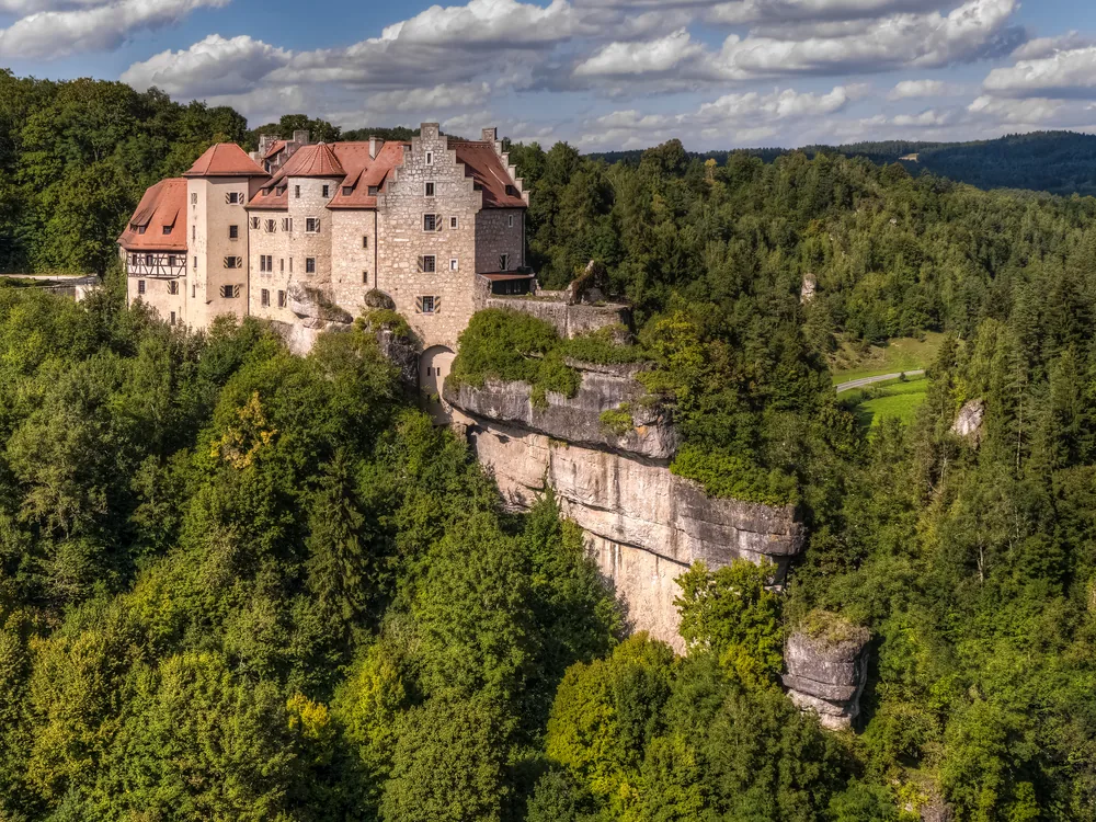 Rabenstein Castle on a petrified sponge-reef outcrop above the Ailsbachtal valley, Franconian Switzerland, Bavaria, Germany