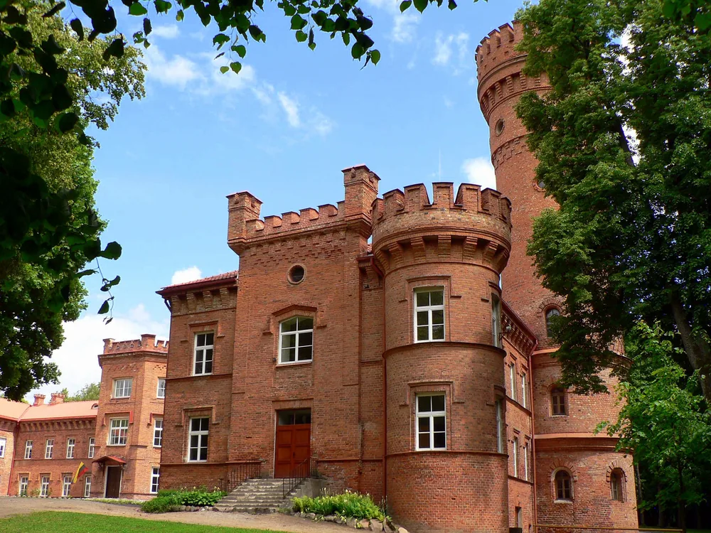 Raudonė Castle — the Renaissance manor and 34-metre cylindrical tower above the Nemunas River floodplain in Tauragė County, Lithuania, on the site of the Teutonic Order's Bayersburg fortress