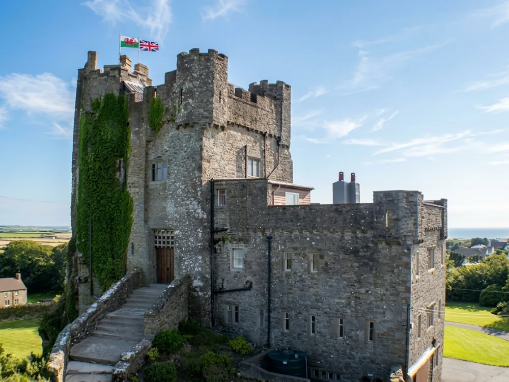 Roch Castle in Pembrokeshire, Wales, a Norman fortress built directly onto a volcanic rock outcrop above St Brides Bay