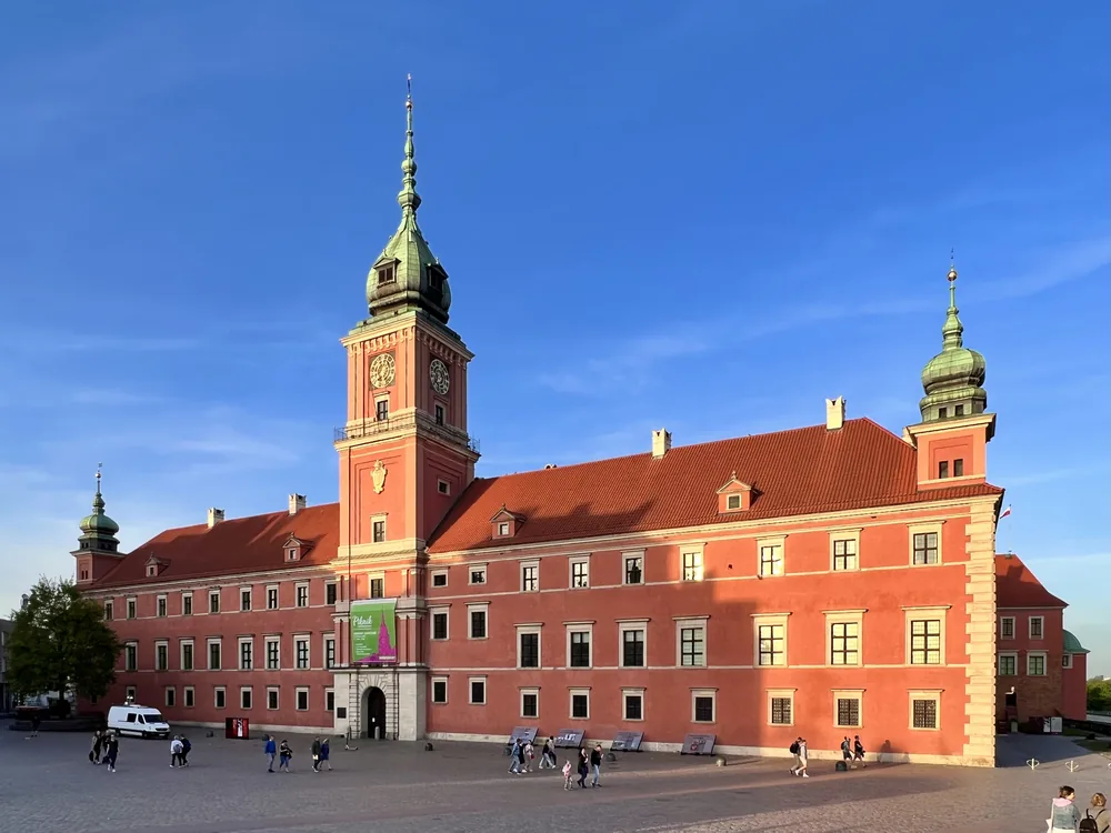 The Royal Castle of Warsaw and its clock tower overlooking Castle Square in the Old Town