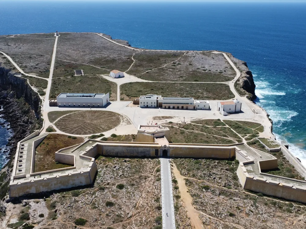 Sagres Fortress at the southwesternmost tip of continental Europe — the dramatic clifftop promontory associated with Prince Henry the Navigator and the launch of Portugal's Age of Discoveries