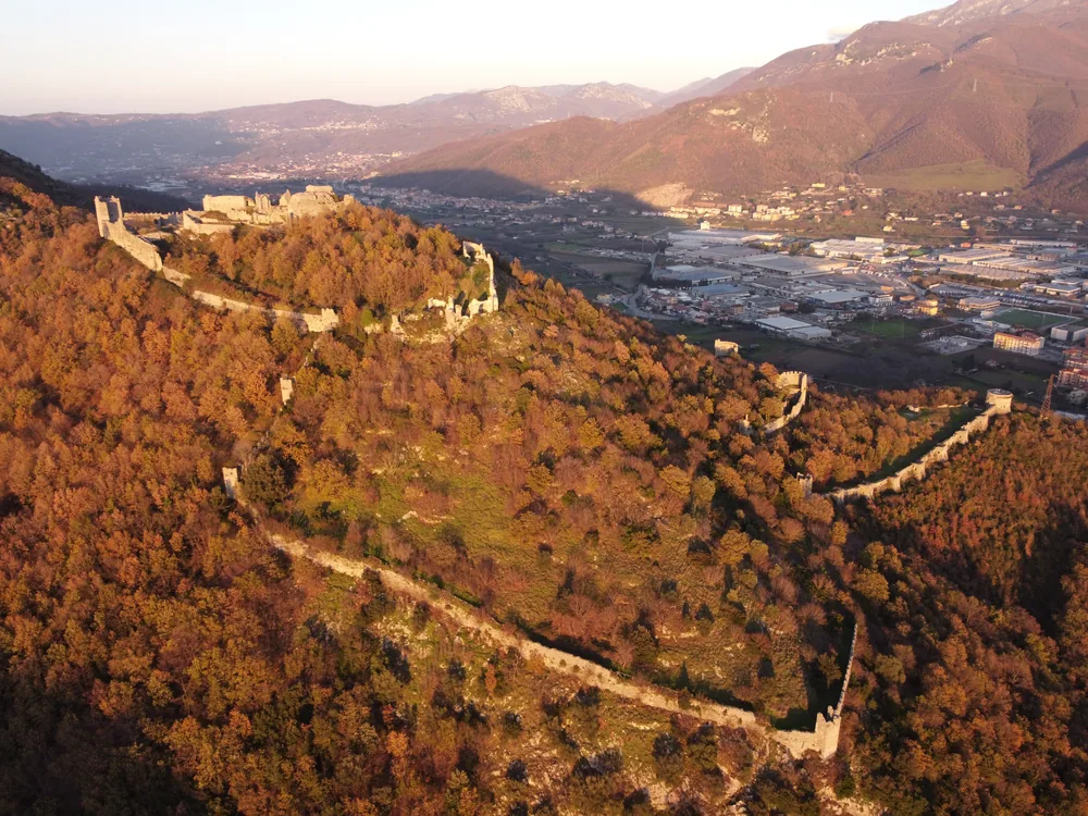 Sanseverino Castle (Castello Medievale dei Sanseverino) above Mercato San Severino, Province of Salerno, Campania — the Norman and Angevin fortress complex on the hilltop, now a Regional Natural Park with Mediterranean scrub and myrtle forest
