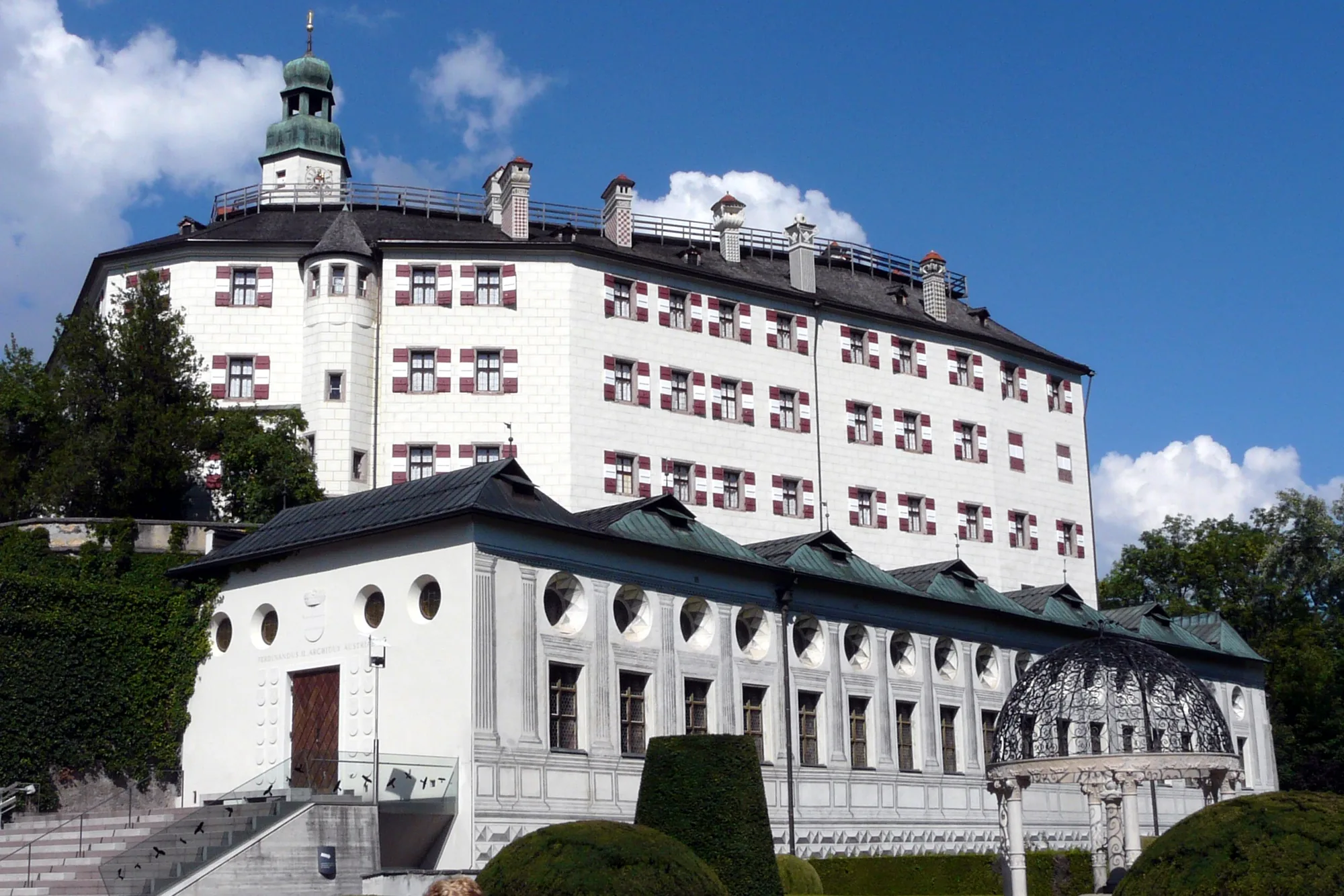Schloss Ambras on its forested hill above Innsbruck, Tyrol, Austria
