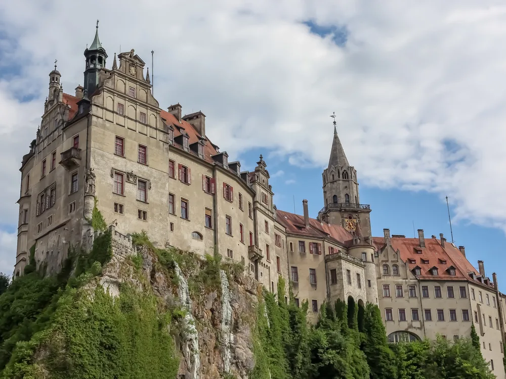 Sigmaringen Castle rising above the Danube River in the town of Sigmaringen, Baden-Württemberg — the French Renaissance Revival seat of the Hohenzollern-Sigmaringen dynasty