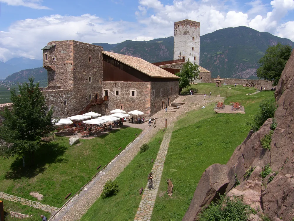 Sigmundskron Castle (Castel Firmiano) on its dolomite outcrop above Bolzano, South Tyrol — the home of the Messner Mountain Museum Firmian