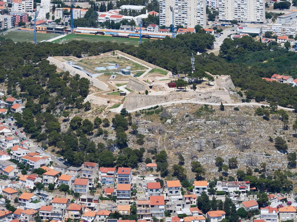 St. John's Fortress (Tvrđava Sv. Ivana / Šubićevac) — the 1646 Venetian hilltop fortress on the highest point above Šibenik, with views over the old town and the Šibenik channel, Croatia