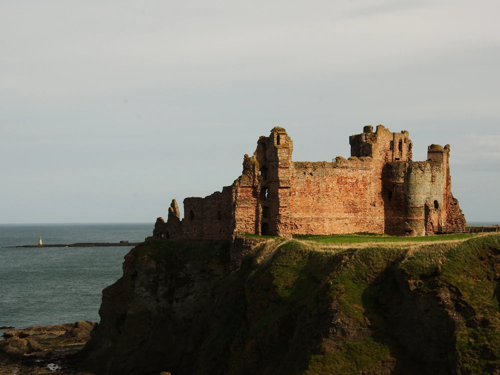 Tantallon Castle red sandstone ruins on sea cliffs above the North Sea, East Lothian, Scotland