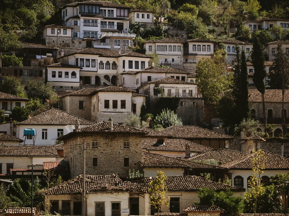 Berat Castle's Ottoman-era towers above the Osum River