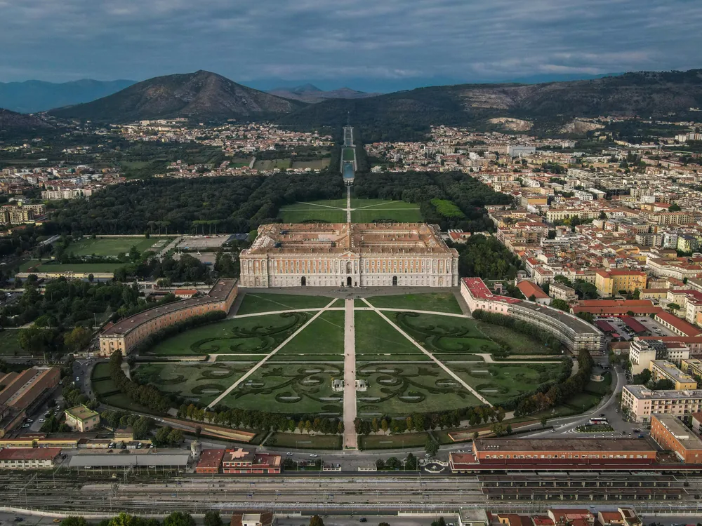 The Royal Palace of Caserta with its baroque gardens and cascade stretching into the distance