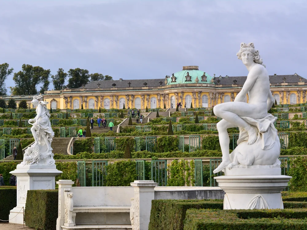 Sanssouci Palace terraces with vine-covered steps rising to the palace facade above the formal Potsdam park, Germany