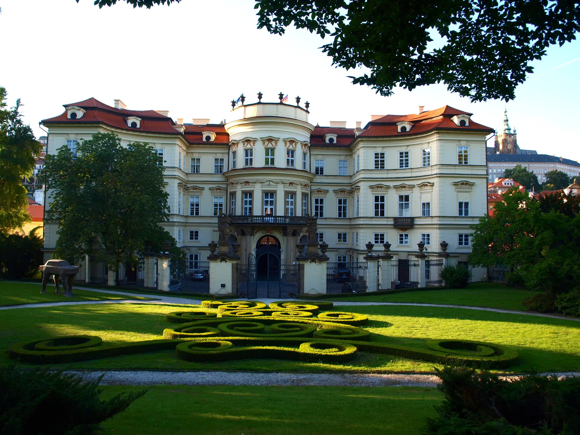 Lobkowicz Palace interior gallery with original paintings and ornate carved frames in the private family collection inside Prague Castle