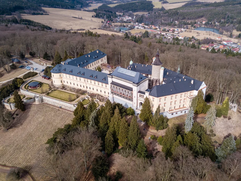 Karlštejn Castle rising above the limestone valley of the Berounka River in central Bohemia