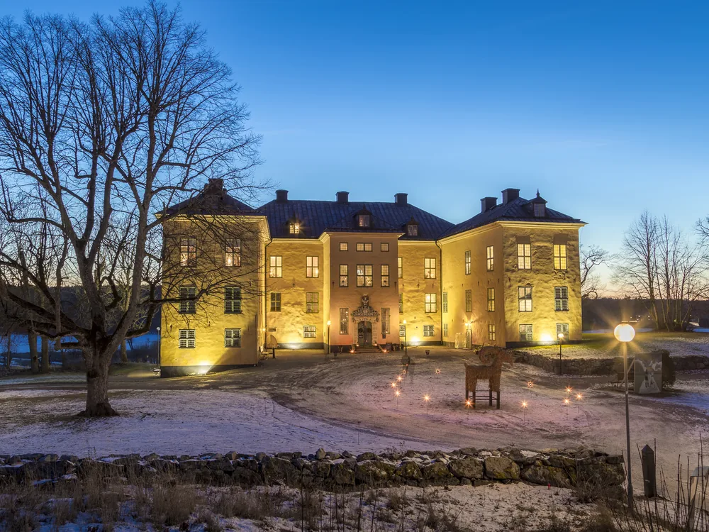 Skokloster Castle on its Lake Mälaren peninsula — the 17th-century Baroque castle with one of Europe's finest arms collections, part of the Stockholm Royal Palace and Castle Tour