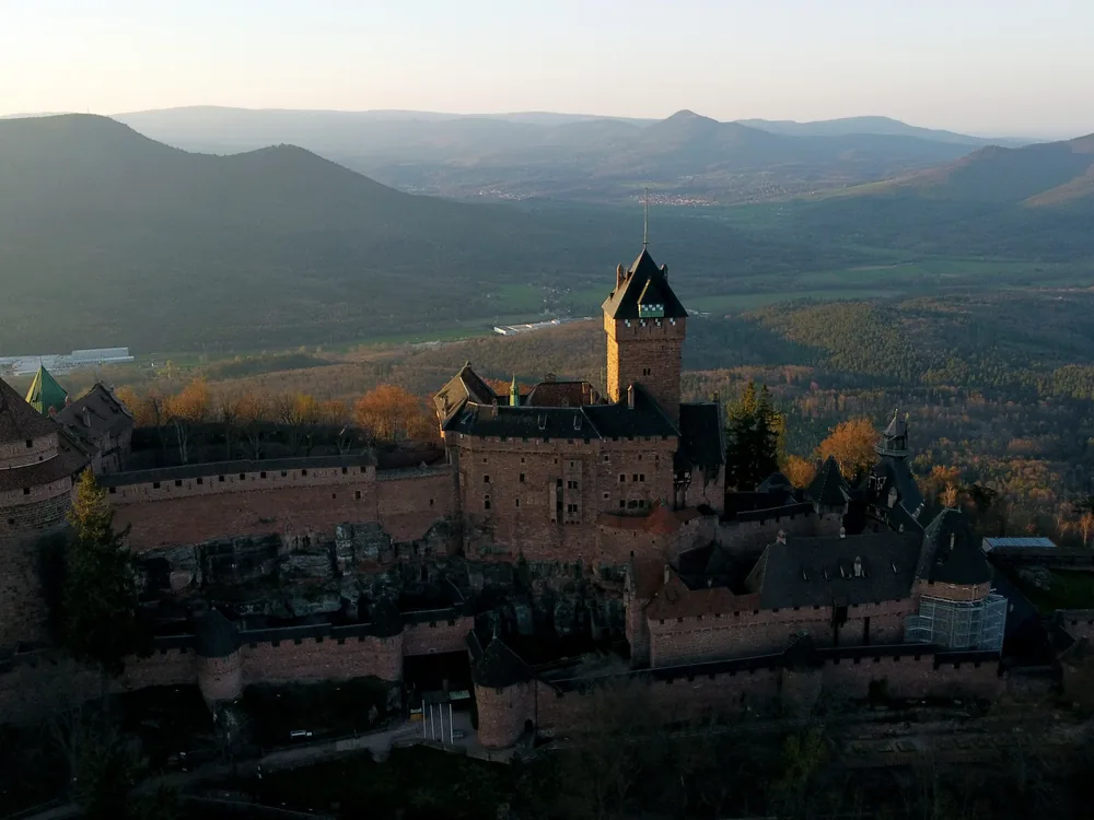 Haut-Kœnigsbourg Castle rising above the Alsace vineyards in autumn
