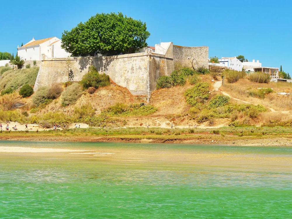 Castelo de Castro Marim above the River Guadiana, with the Andalusian coast of Spain visible across the water